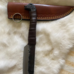 Wolf head blade with rustic blade and leather handle includes sheath